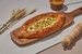 Хачапури лодочка с курочкой и соусом чкмерули - Достаевский